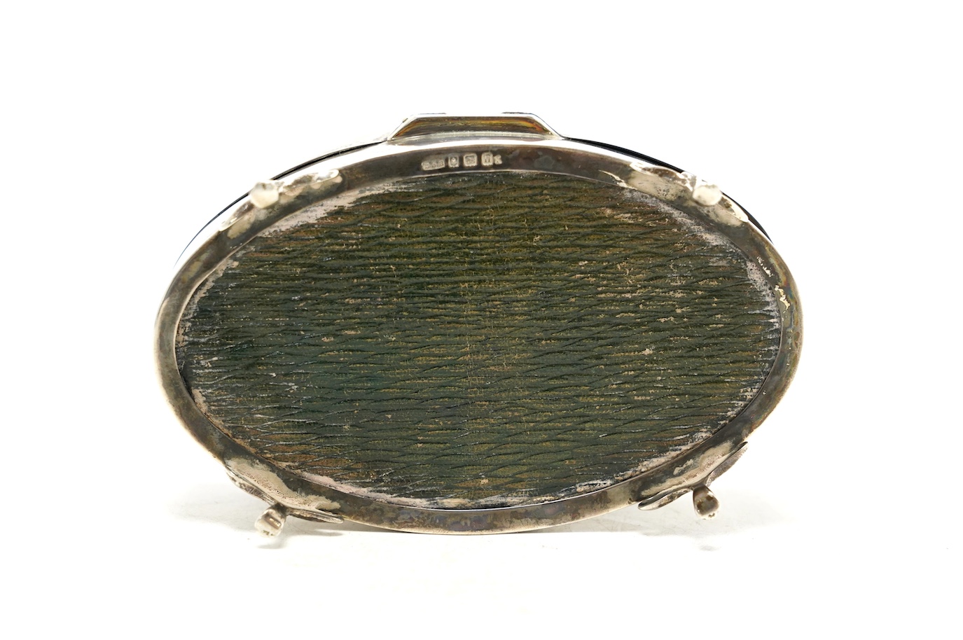 A George V silver and tortoiseshell mounted oval manicure box, E.S. Barnsley & Co Ltd, Birmingham, 1912, 13.5cm, incomplete. Condition - poor